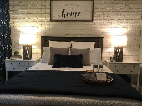 Aged Brick faux brick panel in Coconut White – accent wall installed by a DIY homeowner