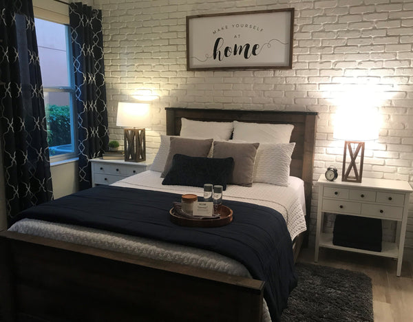 Aged Brick faux brick panel in Coconut White – accent wall installed by a DIY homeowner