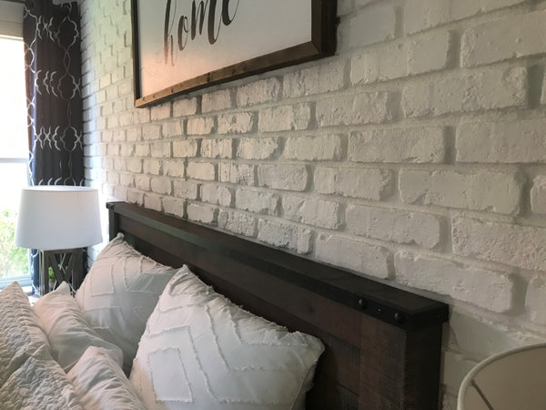 Aged Brick faux brick panel in Coconut White – accent wall installed by a DIY homeowner