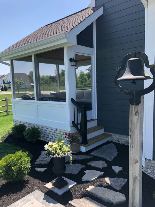 Aged Brick faux brick panel in Scotched Cream – exterior siding installed by a DIY homeowner