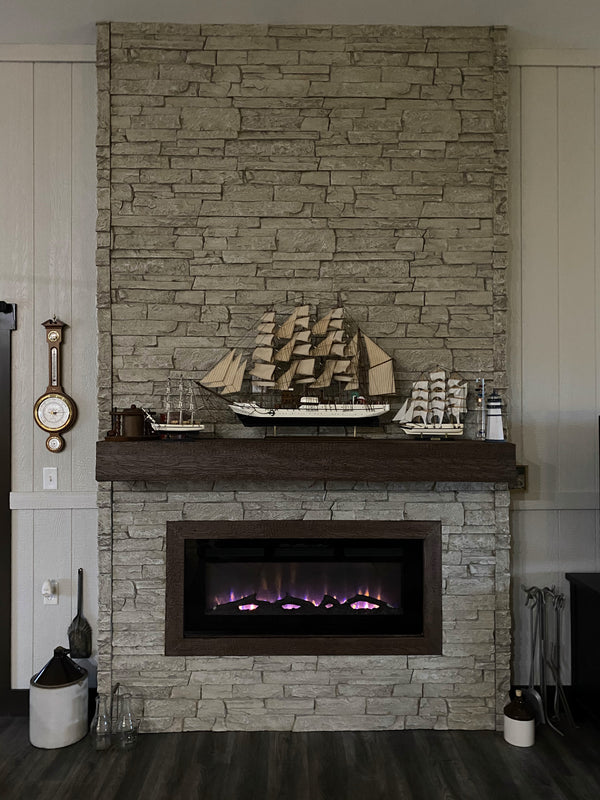 British Brick faux brick panel in Coconut White – fireplace surround and accent wall installed by a DIY homeowner