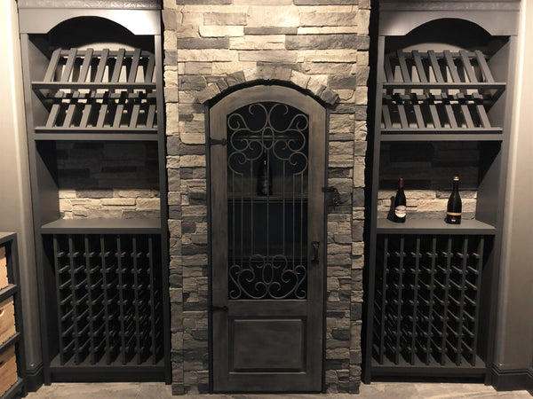 Canyon's Edge faux stone panel in Biscotti Tan – basement wall and accent wall installed by a DIY homeowner