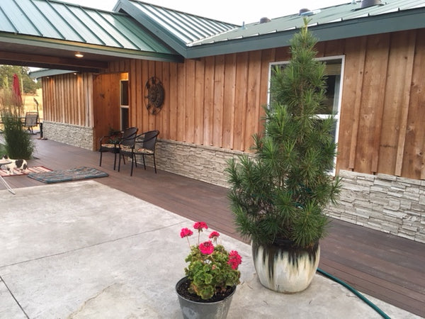 Canyon's Edge faux stone panel in Cappuccino – exterior siding installed by a DIY homeowner