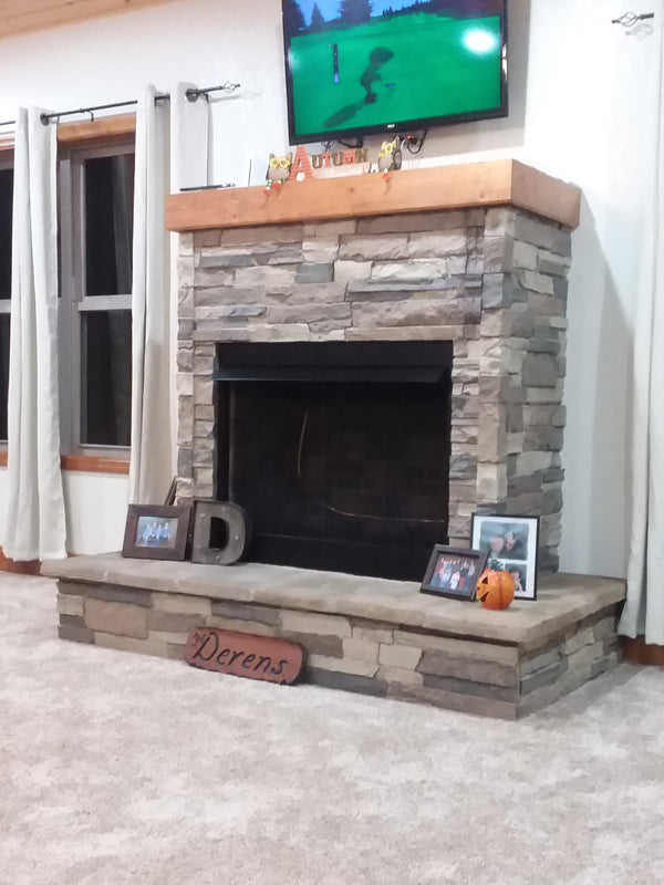 Canyon's Edge faux stone panel in Gray Fox – fireplace surround installed by a DIY homeowner