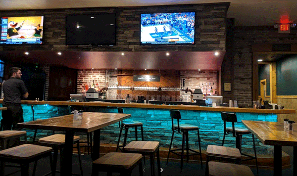 Canyon's Edge faux stone panel in Gray Fox – accent wall installed by a DIY homeowner