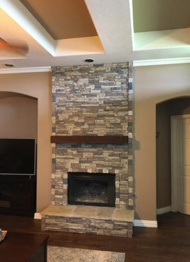 Earth's Valley faux stone panel in Nature's Spirit – fireplace surround and accent wall installed by a DIY homeowner