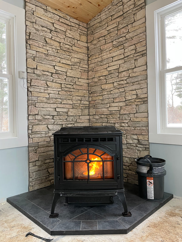 Harvest Ledge faux stone panel in Frosted Blush – fireplace surround installed by a DIY homeowner