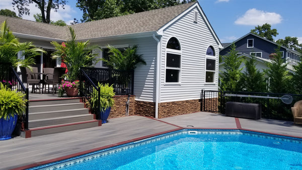 Lightning Ridge faux stone panel in Cappuccino – exterior siding installed by a DIY homeowner