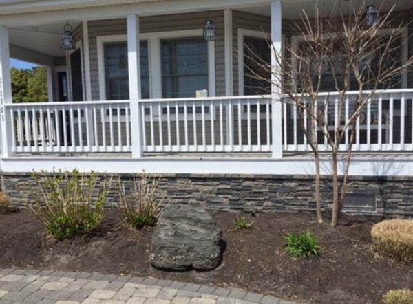 Lightning Ridge faux stone panel in Gray Fox – exterior siding installed by a DIY homeowner
