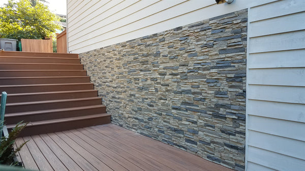 Lightning Ridge faux stone panel in Gray Fox – exterior siding installed by a DIY homeowner
