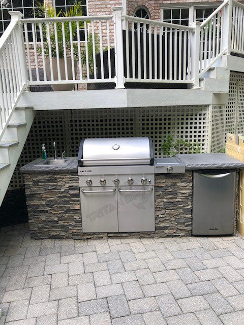 Lightning Ridge faux stone panel in Gray Fox – backyard installed by a DIY homeowner