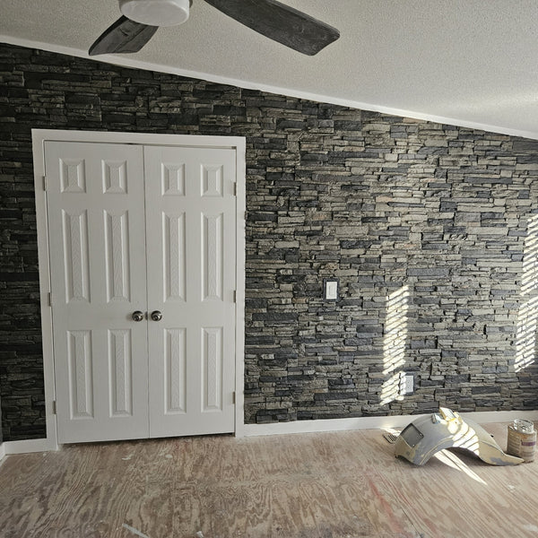 Lightning Ridge faux stone panel in Gray Fox – accent wall installed by a DIY homeowner