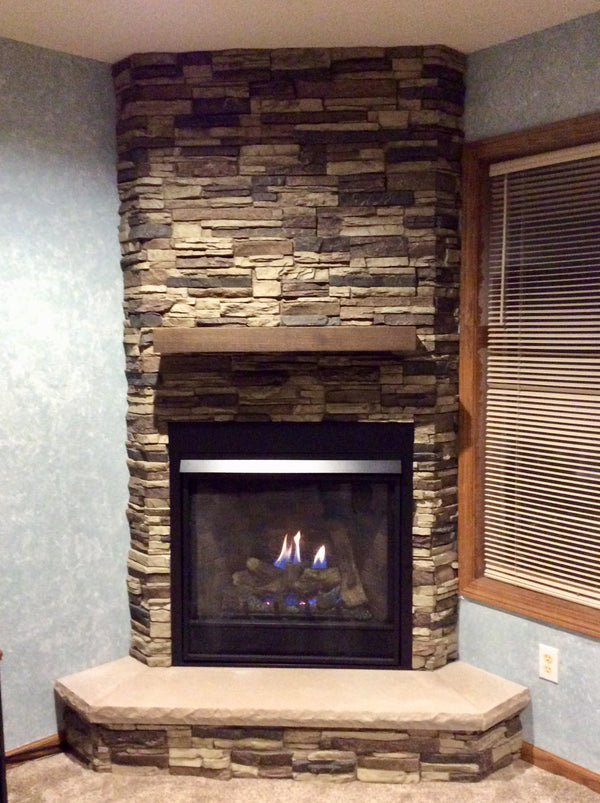 Lightning Ridge faux stone panel in Nature's Spirit – fireplace surround and basement wall