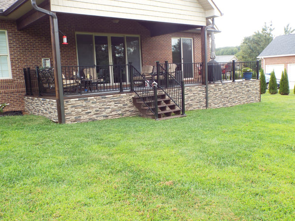 Lightning Ridge faux stone panel in Nature's Spirit – exterior siding and backyard