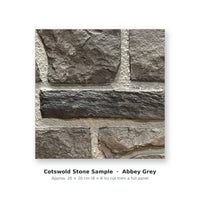 Cotswold Stone sample piece in Abbey Gray, cut from the full faux limestone panel