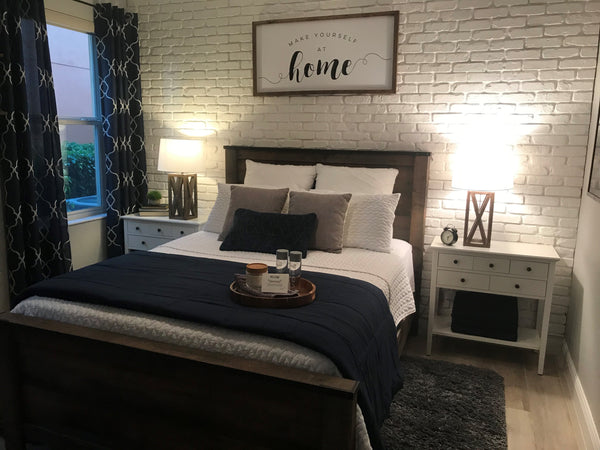 Aged Brick faux brick panel in Coconut White – accent wall installed by a DIY homeowner