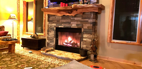 Canyon's Edge faux stone panel in Gray Fox – fireplace surround installed by a DIY homeowner