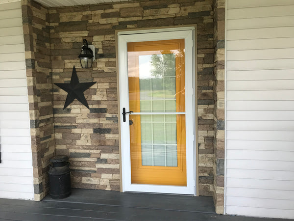 Canyon's Edge faux stone panel in Gray Fox – exterior siding installed by a DIY homeowner