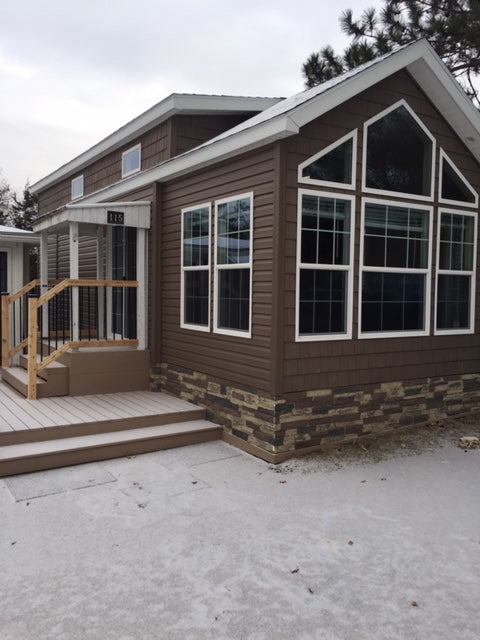 Canyon's Edge faux stone panel in Gray Fox – exterior siding installed by a DIY homeowner