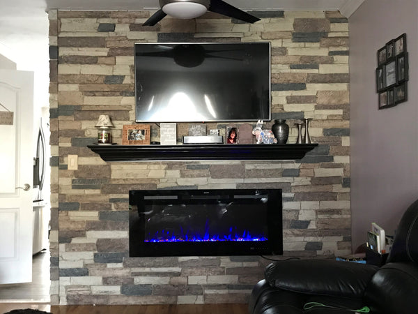 Canyon's Edge faux stone panel in Gray Fox – fireplace surround and accent wall installed by a DIY homeowner