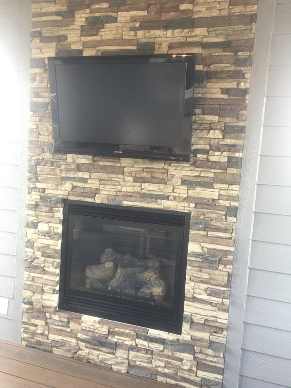 Earth's Valley faux stone panel in Nature's Spirit – fireplace surround and accent wall installed by a DIY homeowner