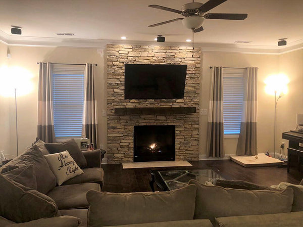 Harvest Ledge faux stone panel in Frosted Blush – fireplace surround and accent wall installed by a DIY homeowner
