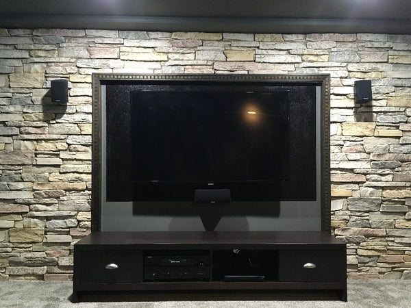 Harvest Ledge faux stone panel in Frosted Blush – basement wall and accent wall installed by a DIY homeowner