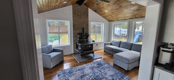 Lightning Ridge faux stone panel in Biscotti Tan – fireplace surround installed by a DIY homeowner