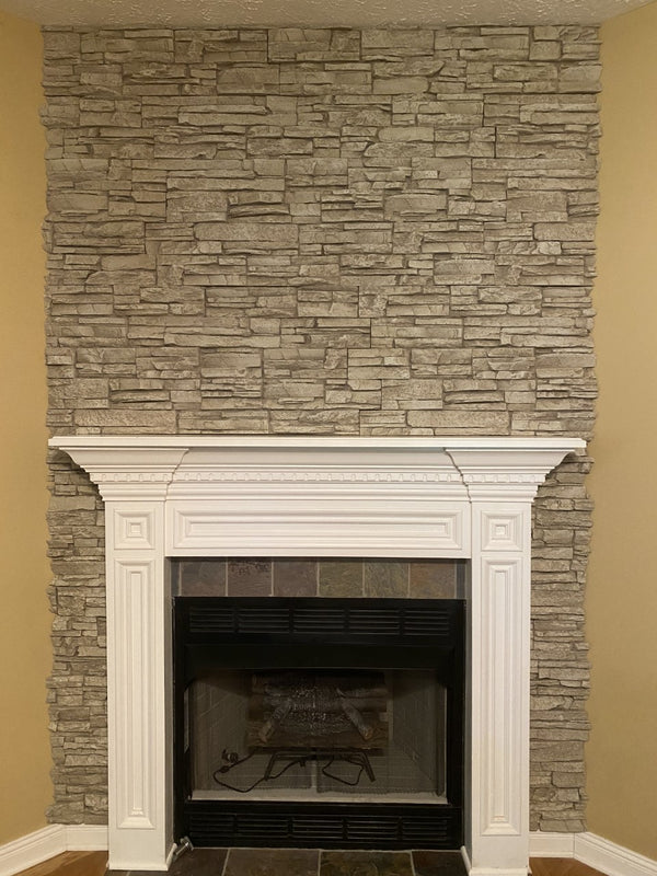Lightning Ridge faux stone panel in Biscotti Tan – fireplace surround installed by a DIY homeowner