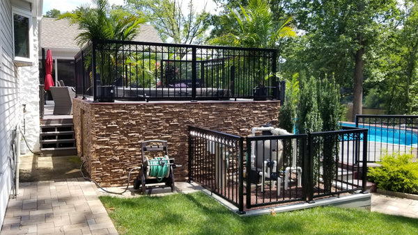 Lightning Ridge faux stone panel in Cappuccino – backyard and accent wall installed by a DIY homeowner