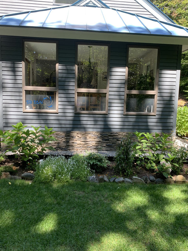 Lightning Ridge faux stone panel in Gray Fox – exterior siding installed by a DIY homeowner