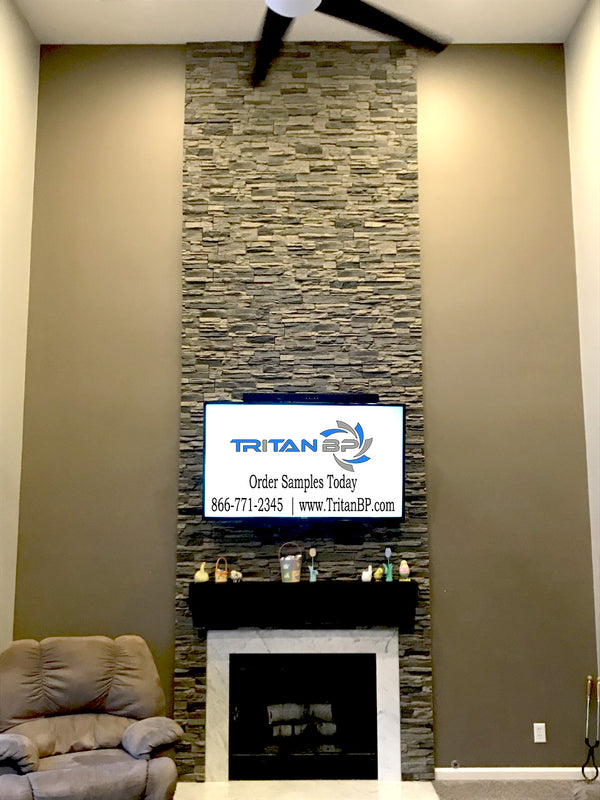 Lightning Ridge faux stone panel in Gray Fox – fireplace surround and feature wall installed by a DIY homeowner