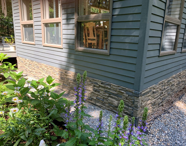 Lightning Ridge faux stone panel in Gray Fox – exterior siding installed by a DIY homeowner
