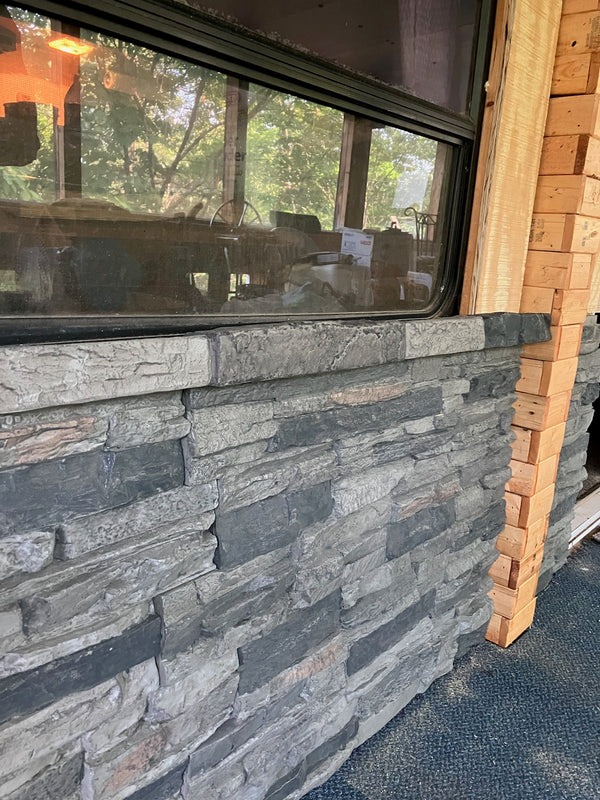 Lightning Ridge faux stone panel in Gray Fox – exterior siding installed by a DIY homeowner