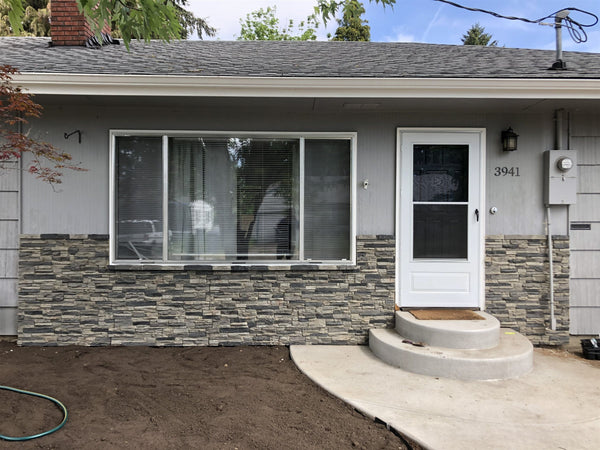 Lightning Ridge faux stone panel in Gray Fox – exterior siding installed by a DIY homeowner