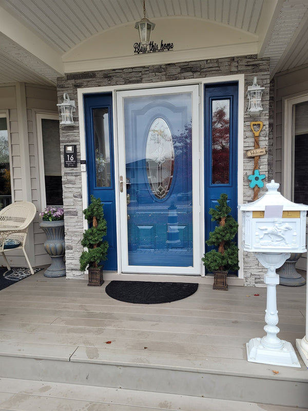Lightning Ridge faux stone panel in Moonlight Gray – exterior siding installed by a DIY homeowner