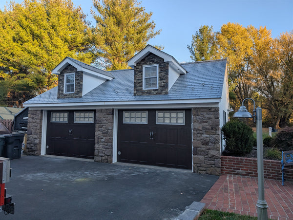 Lightning Ridge faux stone panel in Nature's Spirit – exterior siding and front yard installed by a DIY homeowner