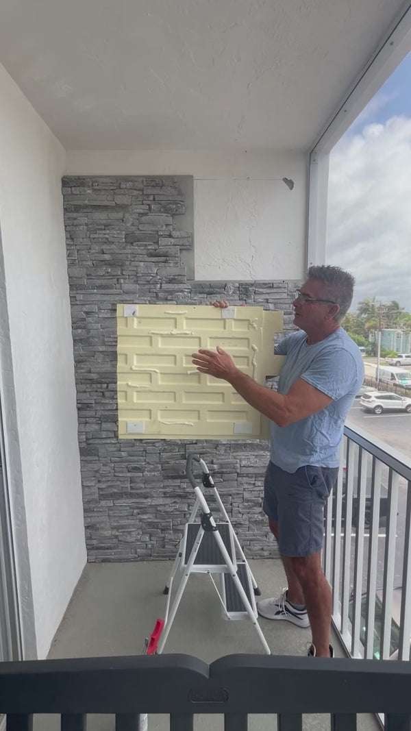 Video: Lightning Ridge faux stone panel in Moonlight Gray – exterior siding and accent wall installed by a DIY homeowner